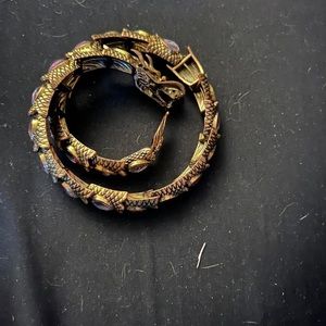 Woman’s dragon bracket